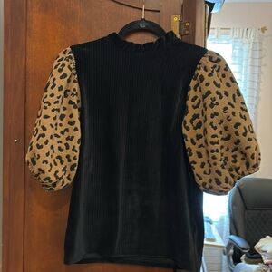 THML top black with leopard print sleeves size extra small